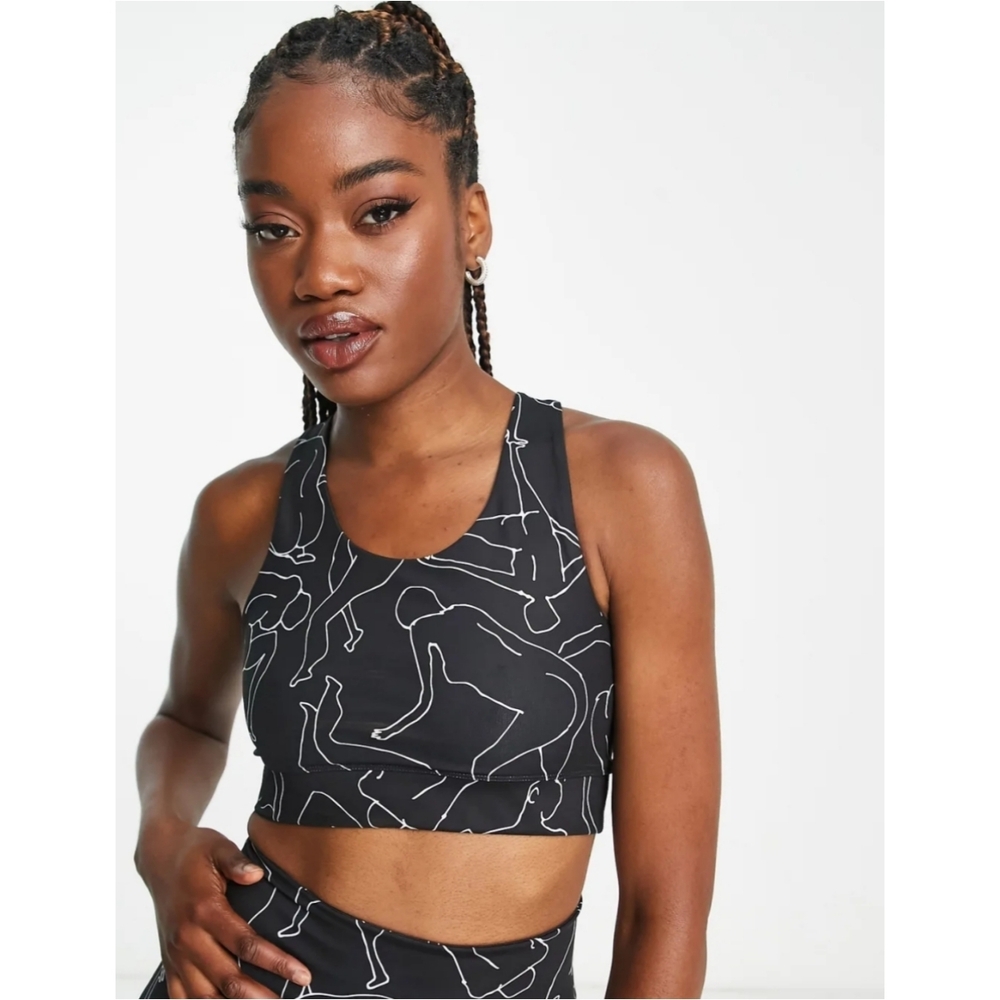 Monki racer sports bra in black line print